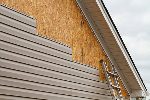 Professional Siding Repair technician working in Smicksburg, PA